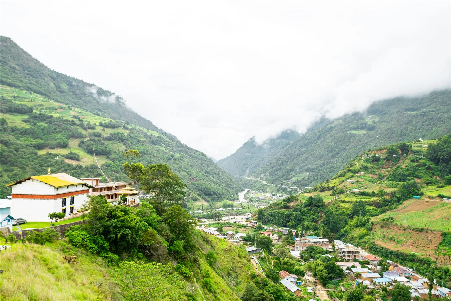 Green mountain valley and village homes in Dirang, Arunachal Pradesh