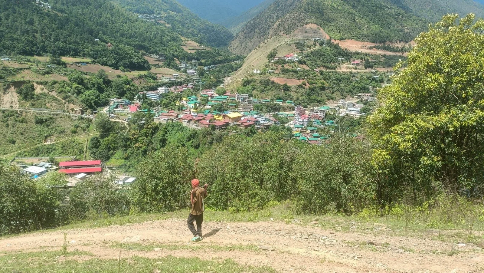 Dirang village spread across a green mountain valley
