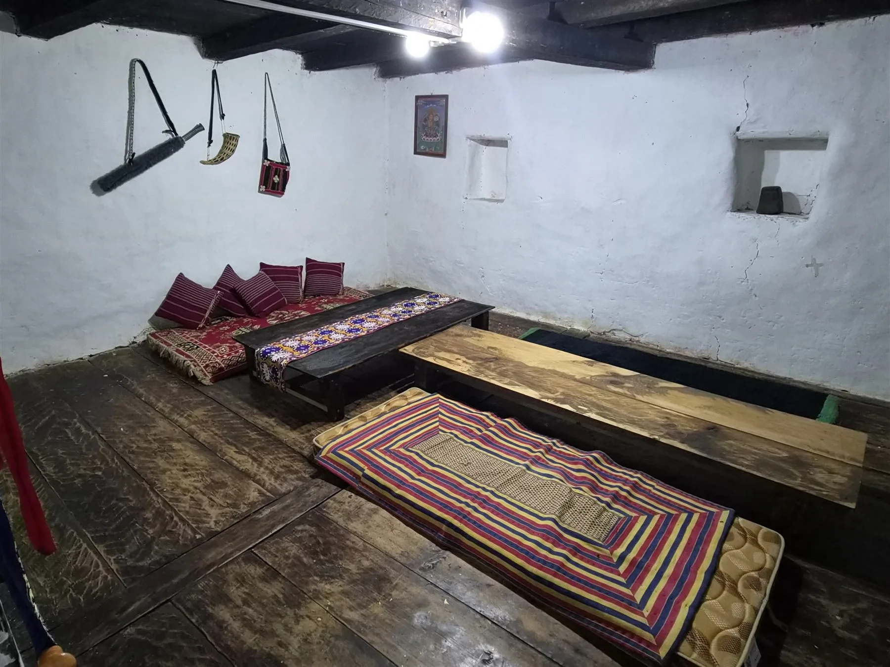 Striped floor cushions arranged around low tables